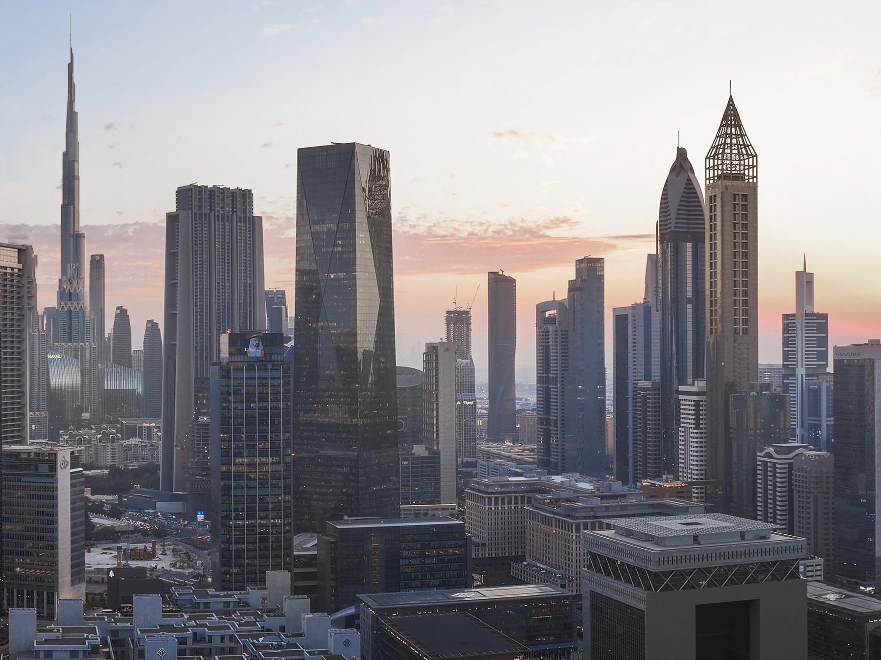 Dubai's financial district at dusk: DIFC, Sheikh Zayed Road, Burj Khalifa